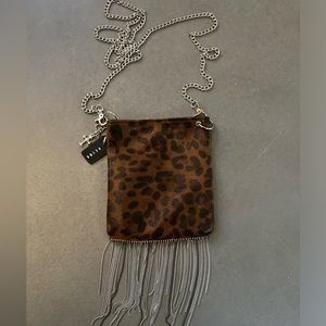 Small cheetah cross body purse.